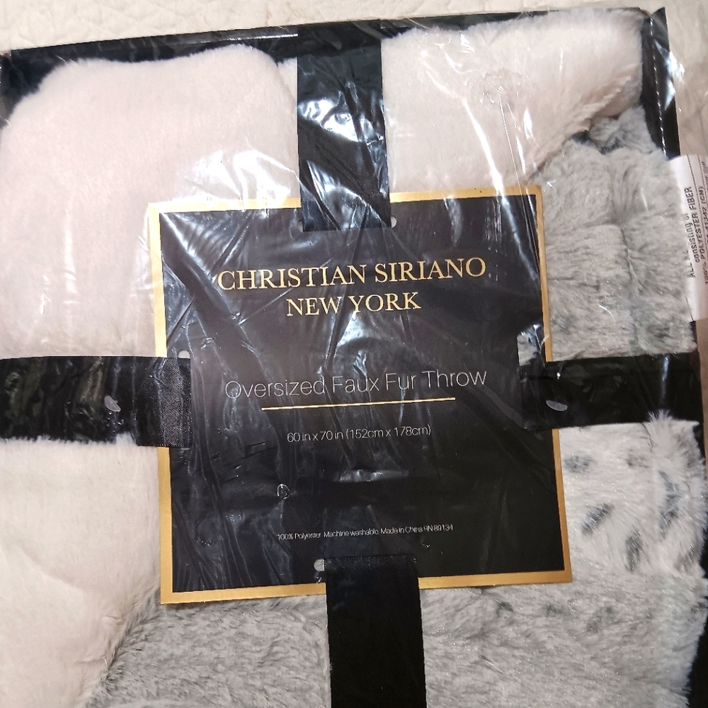 Christian Siriano faux throw blanket.
